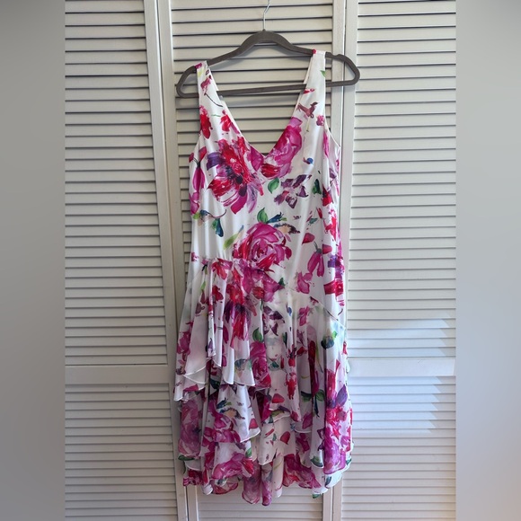 Theia Dresses & Skirts - Theia Size 10 Floral Sleeveless Hi/Lo Dress. PTP 17” length front 42”, Back 46”.